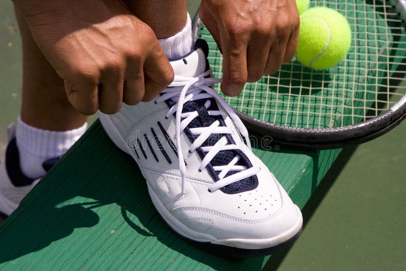 Tennis Player Tying Shoe-Horizontal