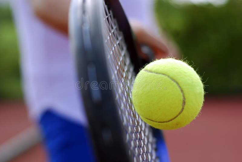 Tennis racket and ball