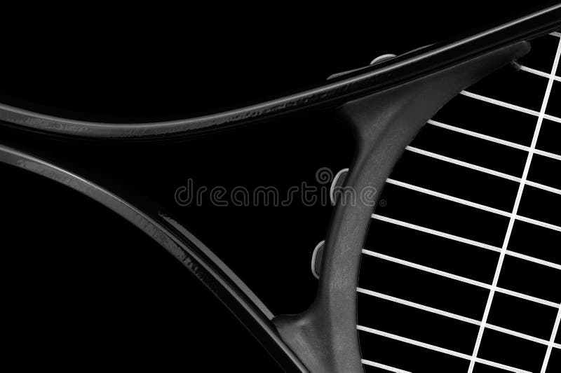 Tennis racket (close-up on a black background). Tennis racket (close-up on a black background).