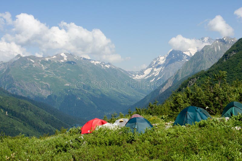 Tent in high mountain stock photos