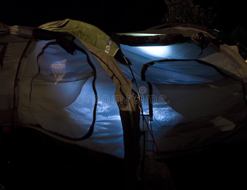 Tent interior lit at night