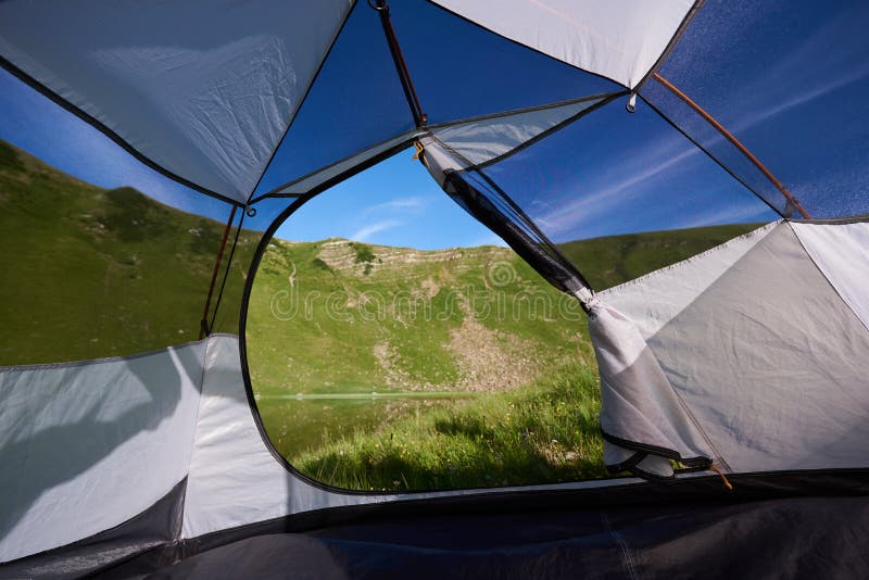 Tent in the mountains stock photo. Image of activity - 124001920