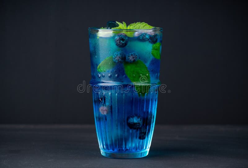 Tequila Based Blue Cocktail with Blueberry. Selective Focus Stock Image