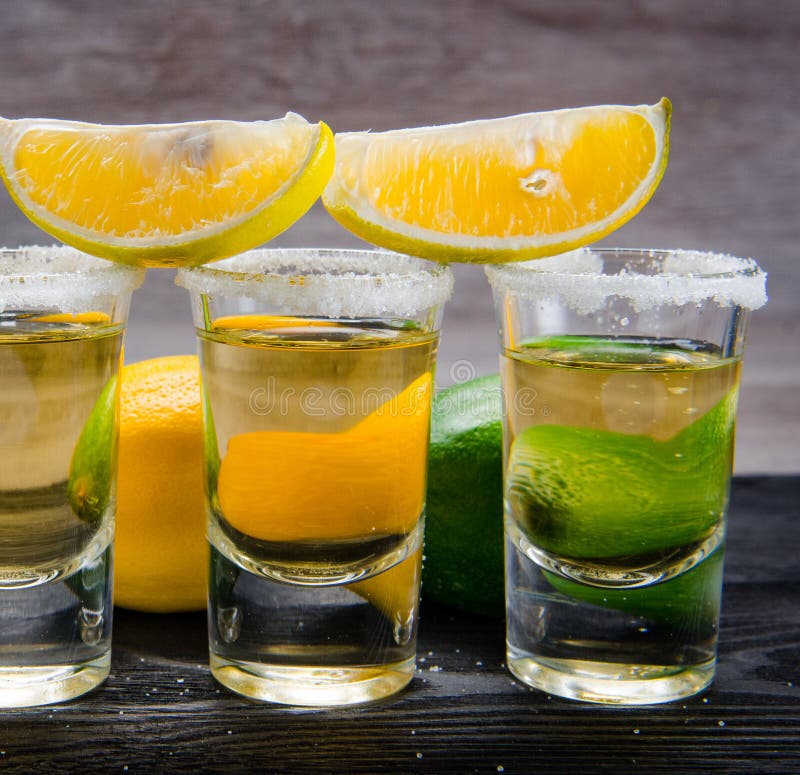 Tequila Drink Served in Glasses with Lime and Salt Stock Photo - Image ...