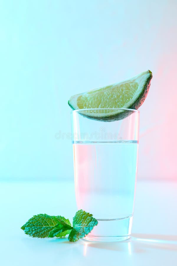 Tequila Shot with Lime Against Black Background Stock Photo Image of
