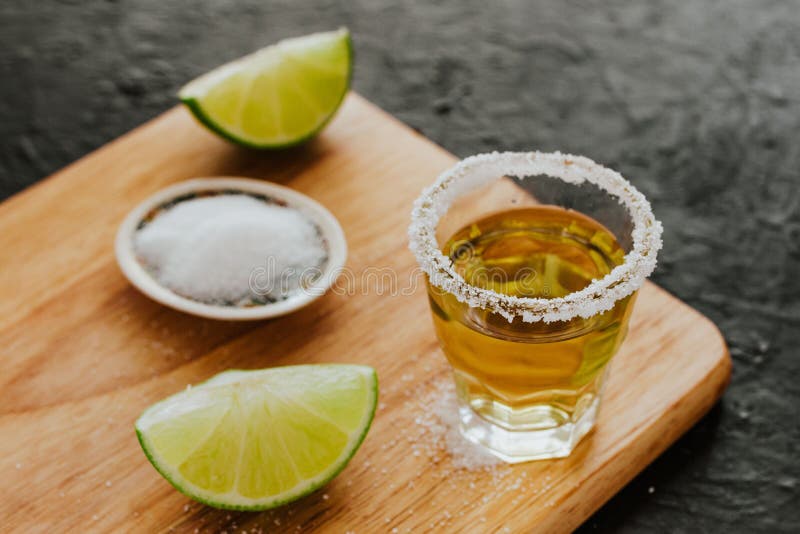 Tequila Shot, Mexican Alcoholic Strong Drinks and Pieces of Lime with ...