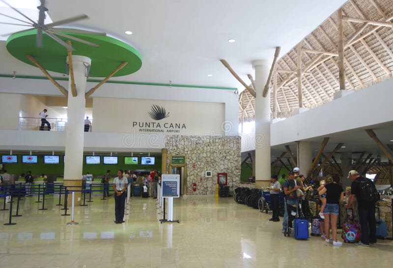 PUNTA CANA, DOMINICAN REPUBLIC -JANUARY 4: Terminal 2 in Punta Cana International Airport on January 4, 2014. The Dominican Republic is the most visited destination in the Caribbean. PUNTA CANA, DOMINICAN REPUBLIC -JANUARY 4: Terminal 2 in Punta Cana International Airport on January 4, 2014. The Dominican Republic is the most visited destination in the Caribbean