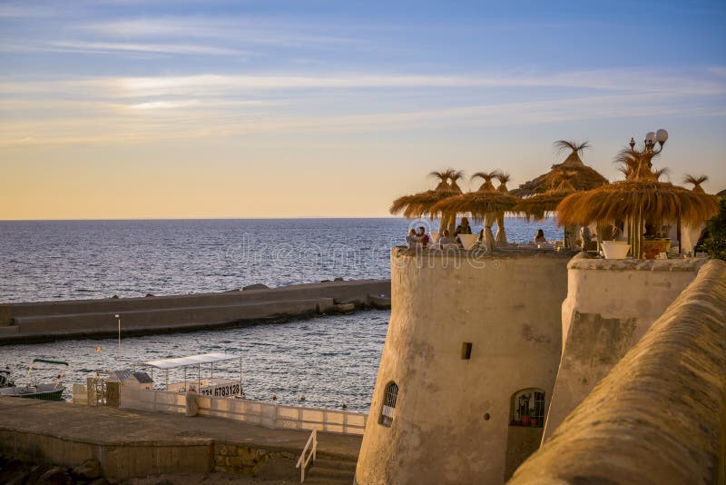 Terrace with umbrellas on sea side