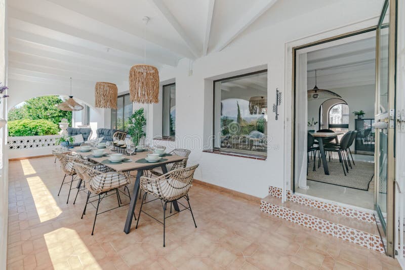 Chalet terrace with large dining table stock photo