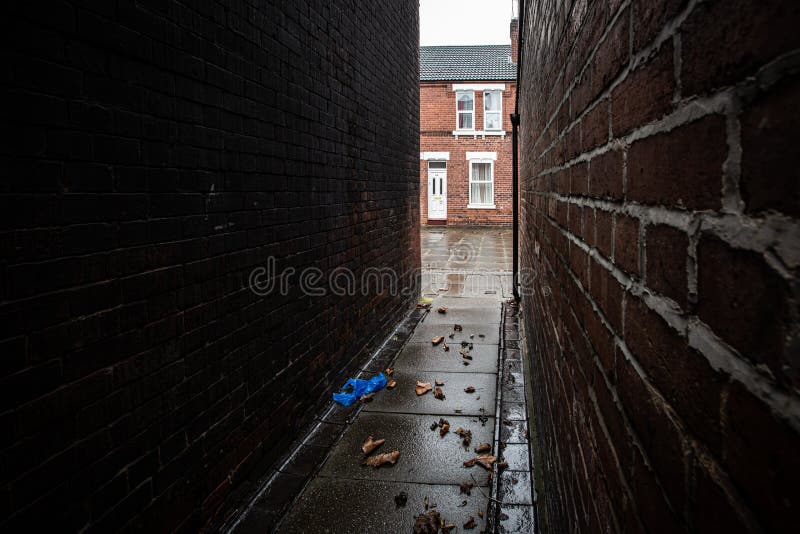 Terraced house from a dark alleyway with copy space