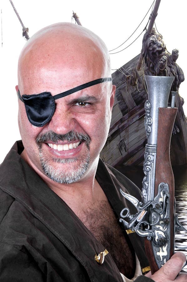 Terrible bearded pirate with a musket royalty free stock photo