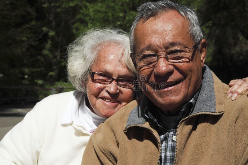 Retired couple having a good time at the park. Retired couple having a good time at the park