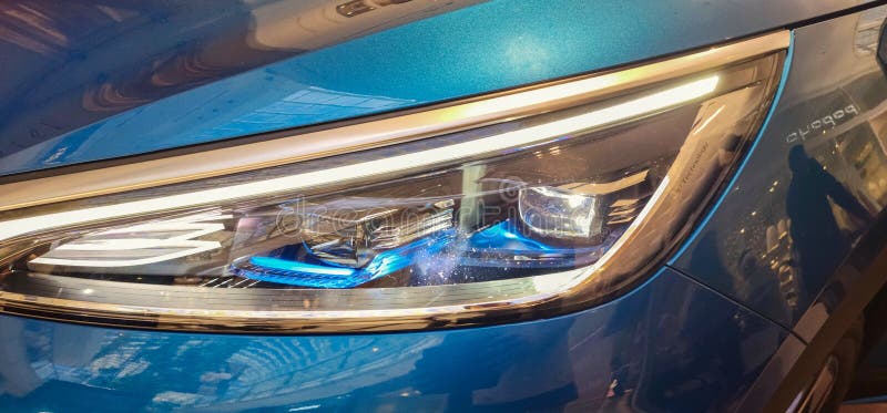 Tesla Electric Car Light with Modern Design and Blue Colour Reflections