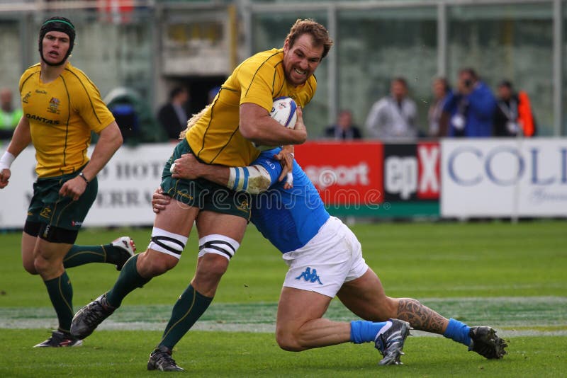 Rugby Cariparma international test match 2010: Italy vs Australia. Florence, Franchi stadium; november 20, 2010. Italys's player Andrea Lo Cicero tackling Australia's Ben McCalman. Rugby Cariparma international test match 2010: Italy vs Australia. Florence, Franchi stadium; november 20, 2010. Italys's player Andrea Lo Cicero tackling Australia's Ben McCalman