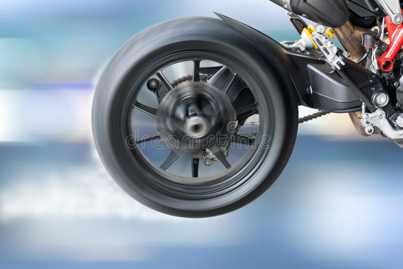 Test the Rotation of the Wheel of a Motorcycle Tire. Stock Photo
