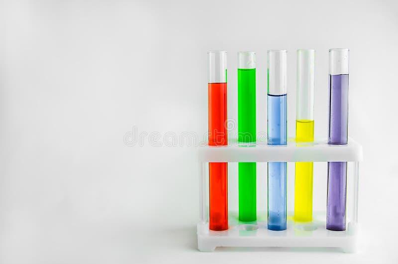 Test Tubes with Multicolored Reagents on a White Background. Chemistry