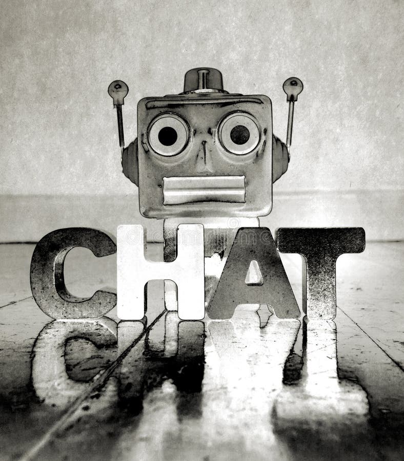 Testa di robot e parola CHAT w fotografia stock libera da diritti