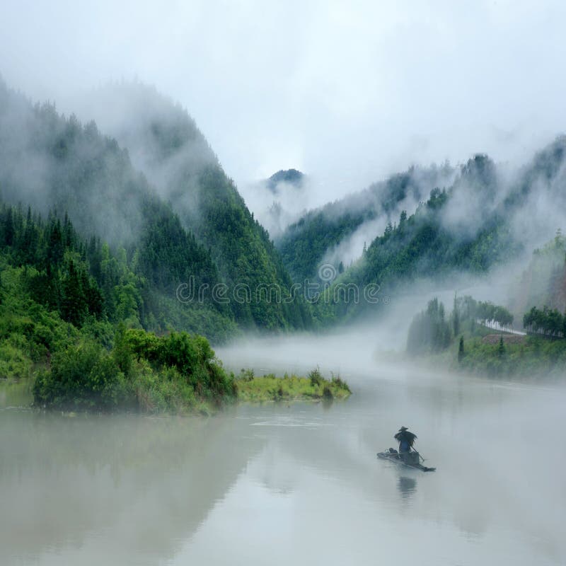 One man drives a small boat along the river. One man drives a small boat along the river