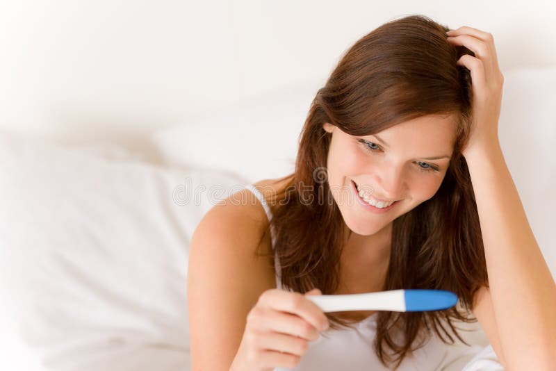 Pregnancy test - happy surprised woman, positive result. Pregnancy test - happy surprised woman, positive result