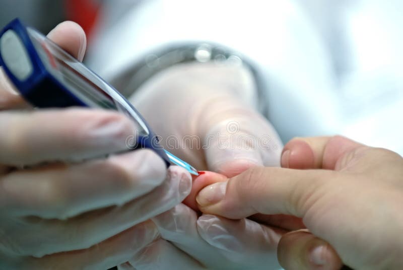 Teste do açúcar de sangue imagens de stock Teste do açúcar de sangue imagens de stock
