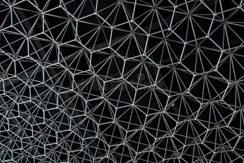 Teste padrão abstrato do metal sob a forma da construção inoxidável fotografia de stock royalty free Teste padrão abstrato do metal sob a forma da construção inoxidável fotografia de stock royalty free