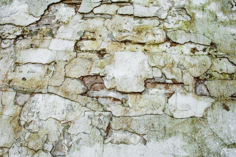 Teste padrão transversal visto da textura da parede da telha textured de pedra Fundo de pedra da telha da rocha imagens de stock Teste padrão transversal visto da textura da parede da telha textured de pedra Fundo de pedra da telha da rocha imagens de stock