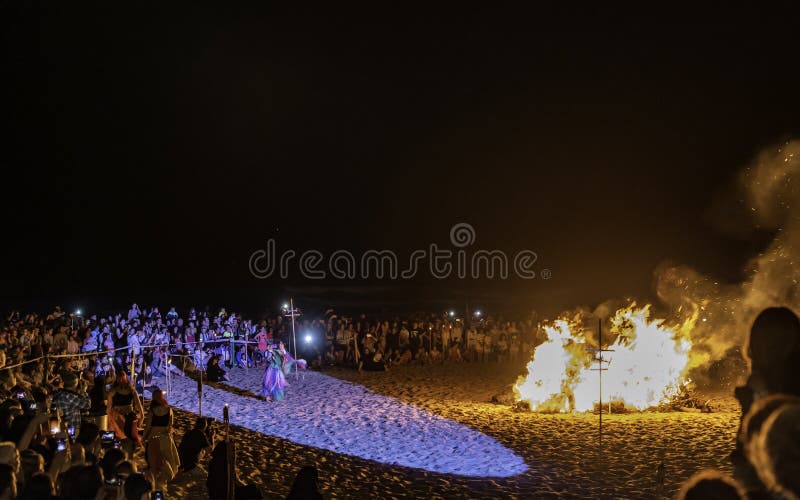 Witches and sorcerers worshiping the fire on the beach. Witches and sorcerers worshiping the fire on the beach