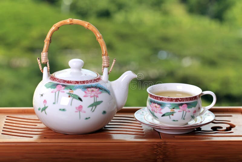 Tetera con té chino imagenes de archivo