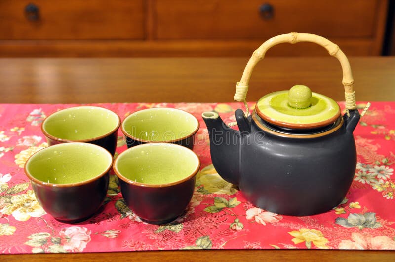 Tetera y taza china fotos de archivo