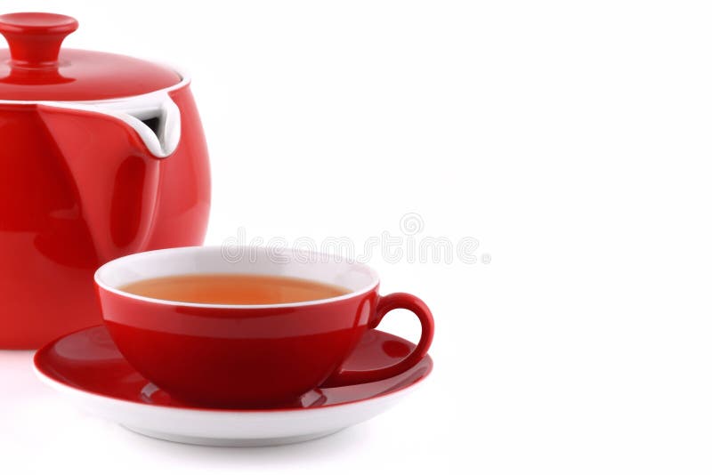 Tetera y taza de té imagen de archivo