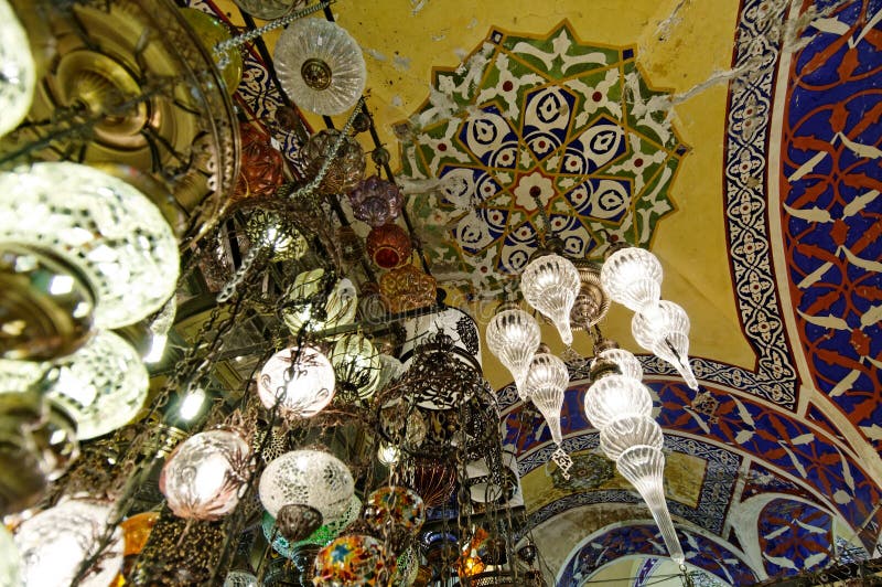 Chandeliers or hanging lamps and an ornate ceiling in the Grand Bazaar, Istanbul, Turkey. Chandeliers or hanging lamps and an ornate ceiling in the Grand Bazaar, Istanbul, Turkey.