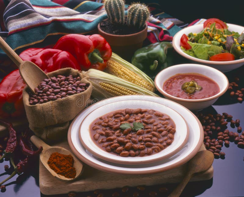 Tex Mex Food. Mexican pinto beans with hot chili sauce. Tex Mex Food. Mexican pinto beans with hot chili sauce.
