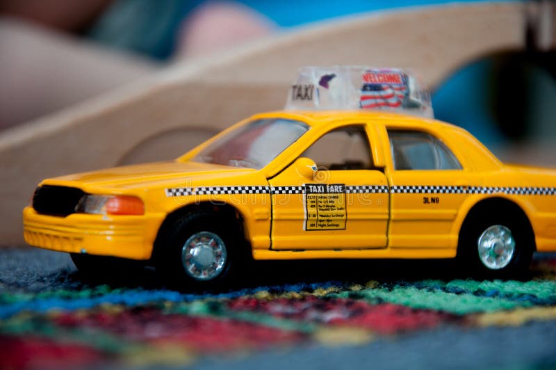 Texi driver , toy car , small macro.