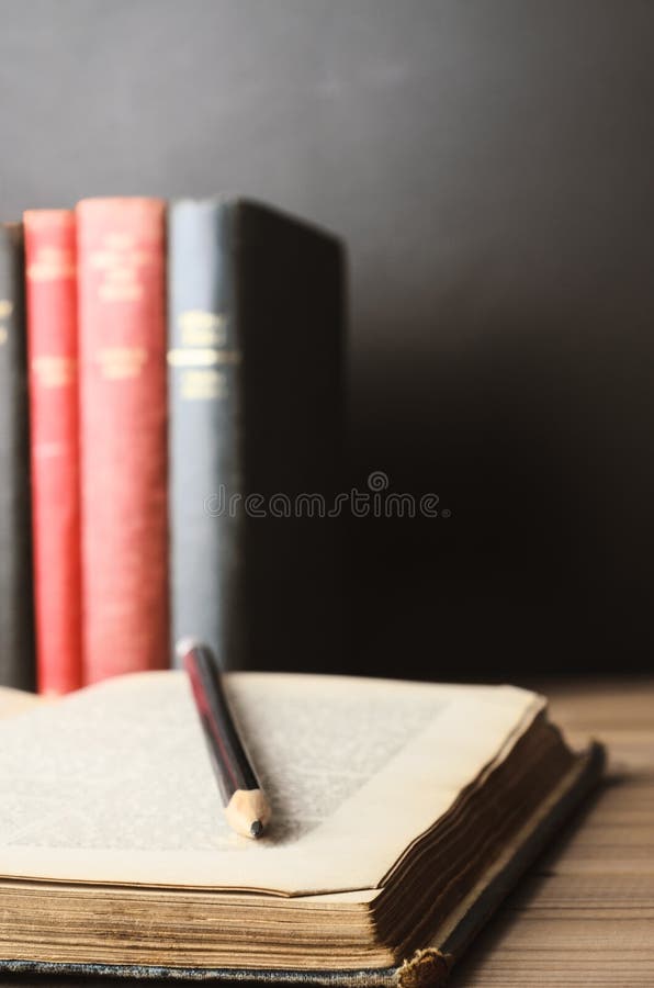 Textbooks Study Concept with Chalkboard Background royalty free stock photo Textbooks Study Concept with Chalkboard Background royalty free stock photo