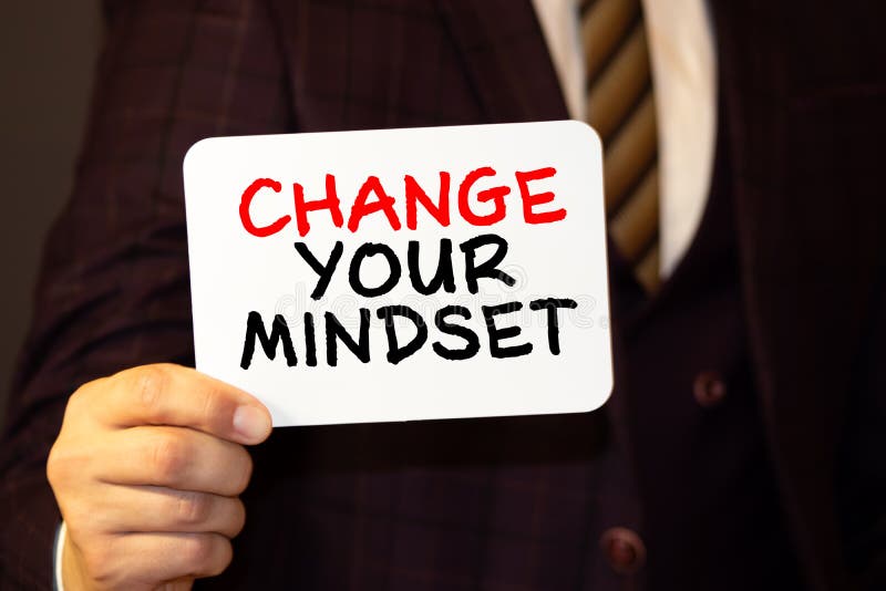 Text change your mindset on note paper stock image