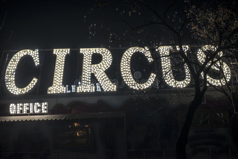 Text circus in the night. Circus office illuminated stock photos