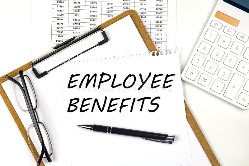 Text EMPLOYEE BENEFITS on the White Paper on Clipboard with Chart and Calculator Stock Photo