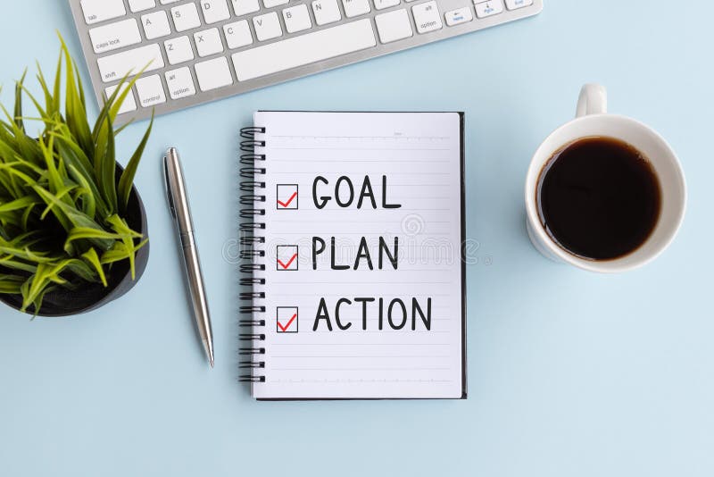Text Goal, Plan and Action on notepad royalty free stock photography