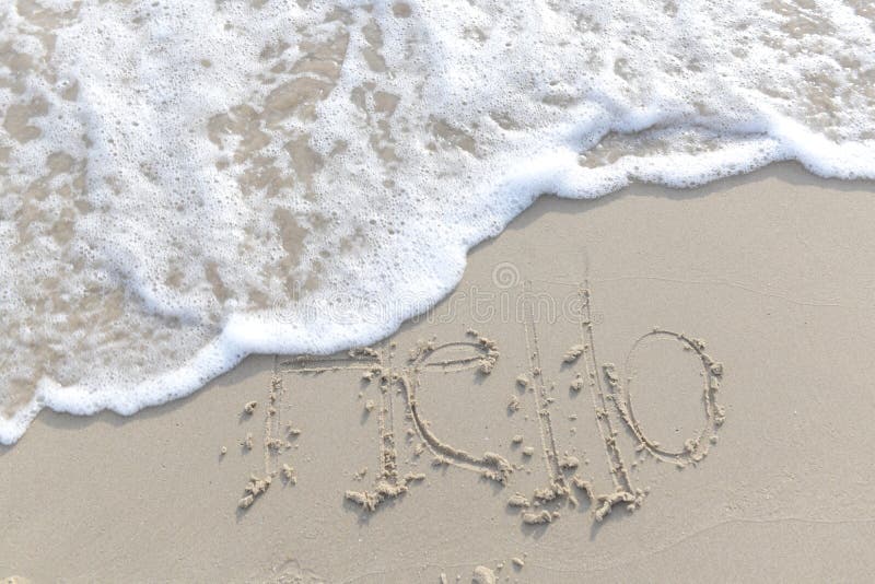 The Text Hello Write on the Sand Beach Stock Image - Image of romantic