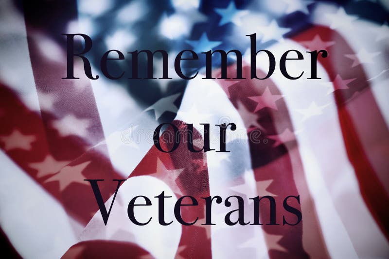 Text minns våra veteran och flaggan av USA royaltyfria bilder Text minns våra veteran och flaggan av USA royaltyfria bilder