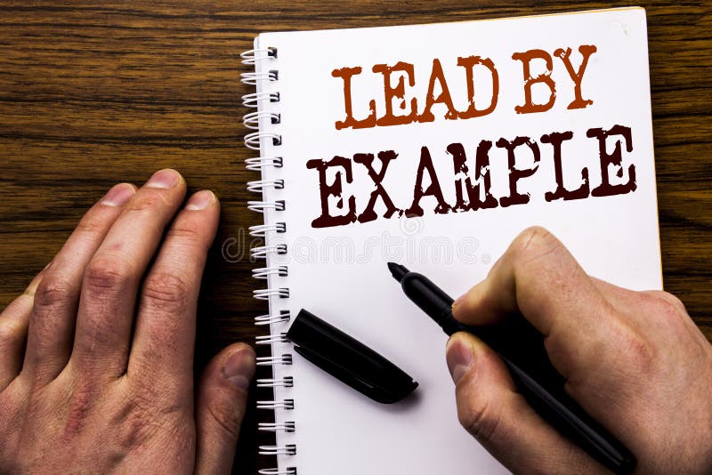 Text scris de mână care arată cuvântul plumb de exemplu. concept de afaceri pentru inspirație motivațională scrisă pe un laptop ta royalty free stock images