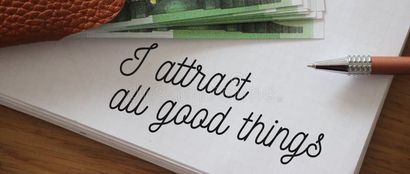 Text showing I Attract All Good Things and 100 Euro banknotes Positive attraction law Motivation Affirmation Concept royalty free stock photos