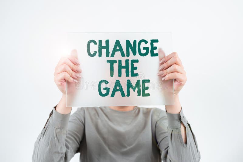 Text showing inspiration Change The Game. Business concept Make a movement do something different new strategies Woman stock photography