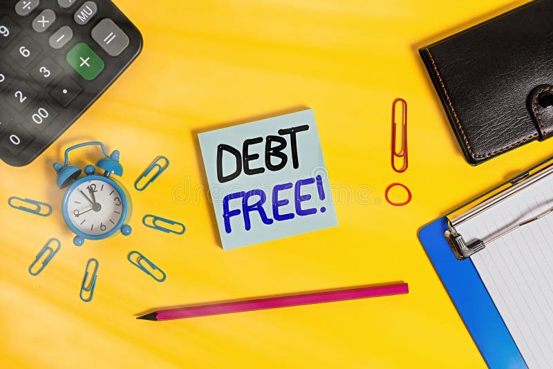Text sign showing Debt Free. Conceptual photo free from owning any money to any individual or a company Alarm clipboard calculator royalty free stock image