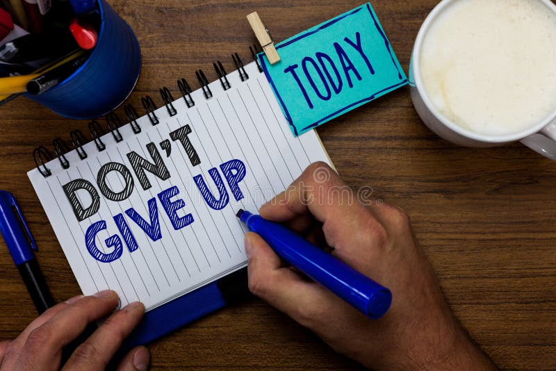 Text sign showing Don t not Give Up. Conceptual photo Determined Persevering Continue to Believe in Yourself Man holding marker no royalty free stock photos Text sign showing Don t not Give Up. Conceptual photo Determined Persevering Continue to Believe in Yourself Man holding marker no royalty free stock photos