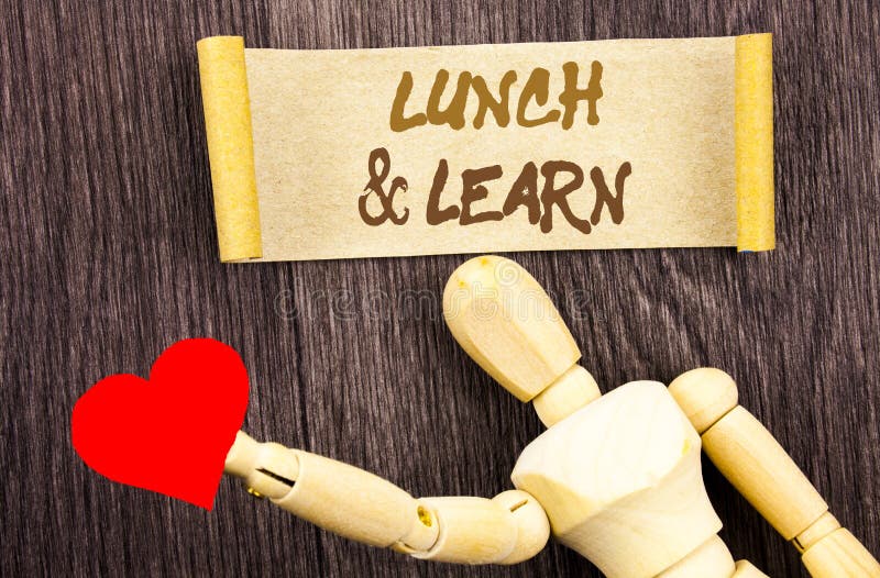 Text sign showing Lunch And Learn. Conceptual photo Presentation Training Board Course written on Sticky Note Love Heart Holding B royalty free stock images