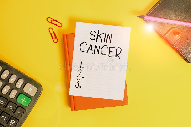 Text sign showing Skin Cancer. Conceptual photo uncontrolled growth of abnormal skin cells due to sun exposure Pile of