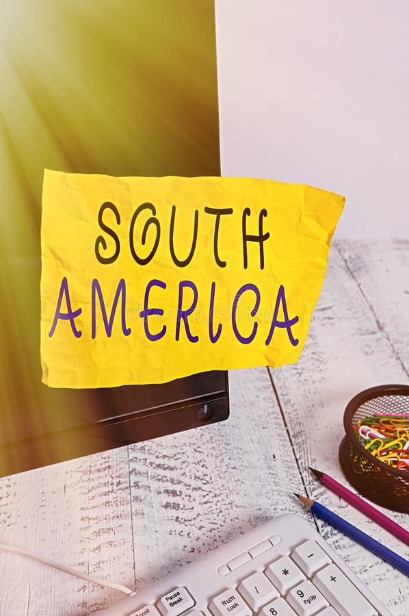 Text sign showing South America. Conceptual photo Continent in Western Hemisphere Latinos known for Carnivals Note paper taped to. Text sign showing South stock photo Text sign showing South America. Conceptual photo Continent in Western Hemisphere Latinos known for Carnivals Note paper taped to. Text sign showing South stock photo