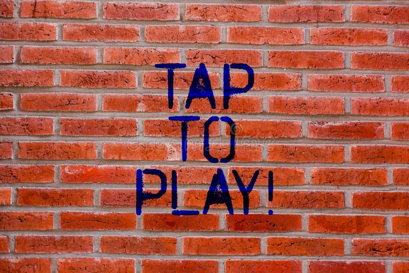 Text sign showing Tap To Play. Conceptual photo Touch the screen to start playing a game or something else Brick Wall art like