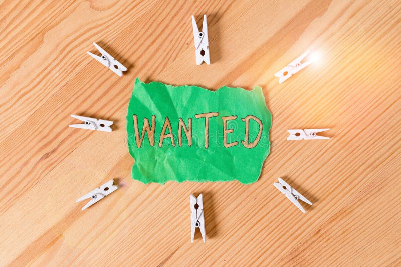 Text sign showing Wanted. Conceptual photo Desire something Wish want Hoping for Somebody being searched Colored clothespin papers royalty free stock images